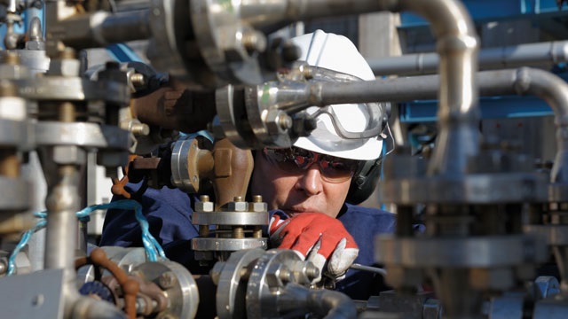 Alfa Laval engineer repairing machinery